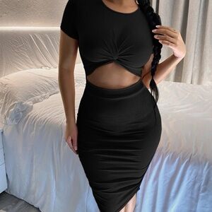 Women’s black twist front peekaboo dress in small